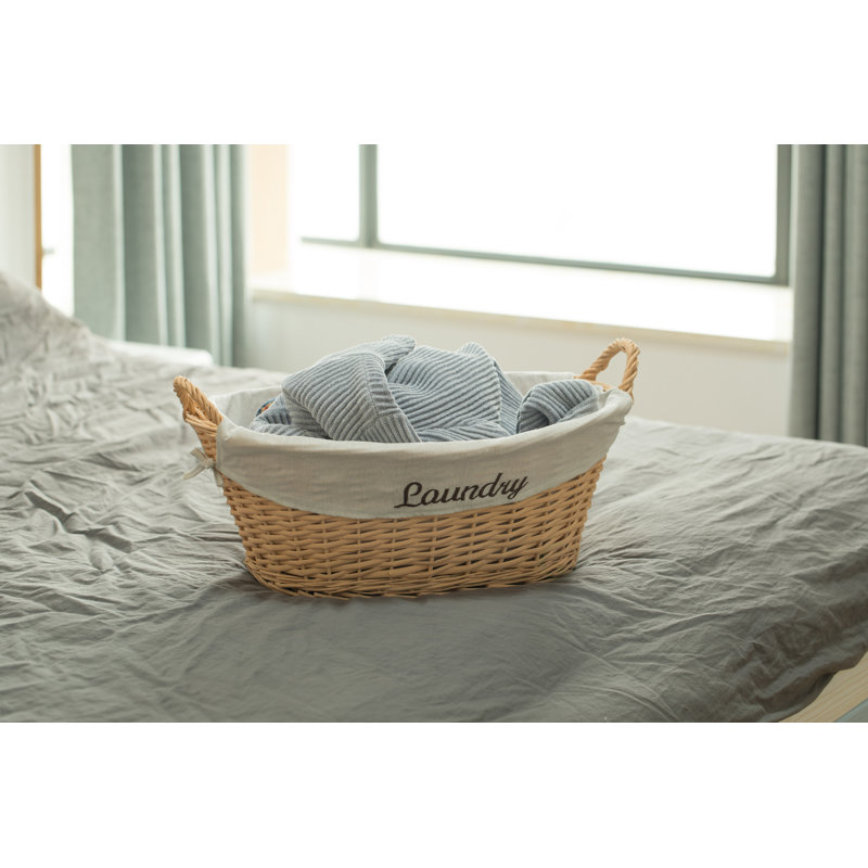 Panier à linge en osier avec doublure et poignées latérales