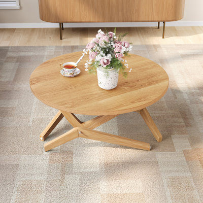 Table basse ronde 2-en-1 avec hauteur réglable, bois massif, design polyvalent et peu encombrant pour une vie moderne