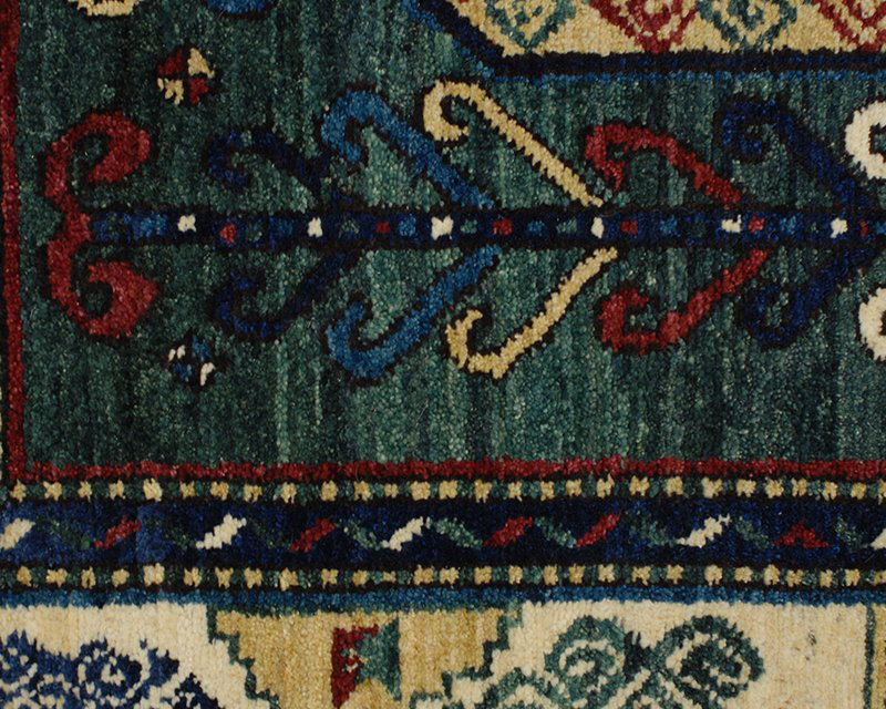Sevan Wool Southwestern Area Rug in Beige/Green