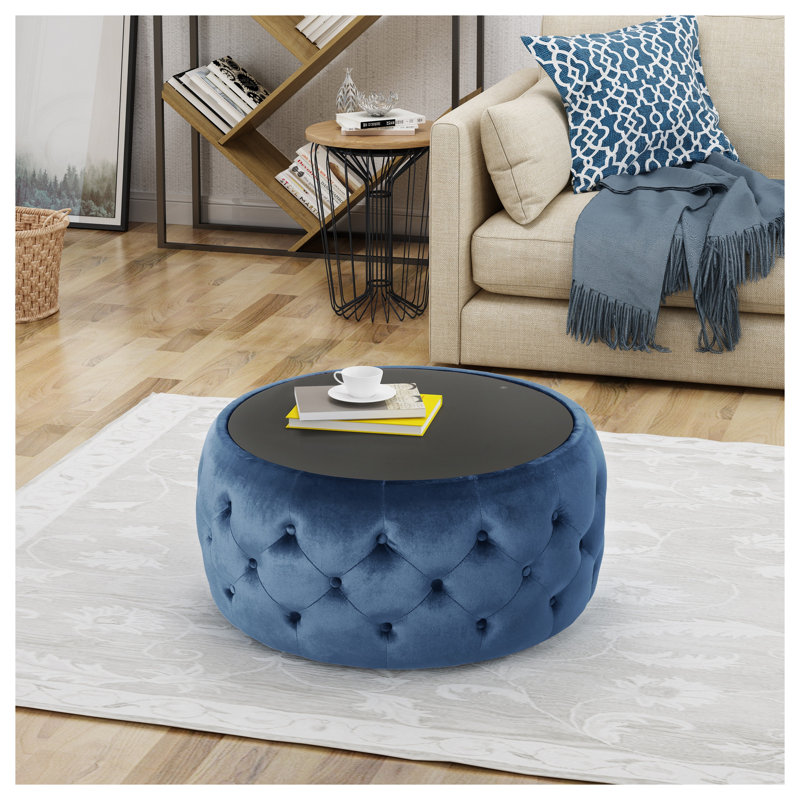Repose-pieds rond en velours bleu foncé