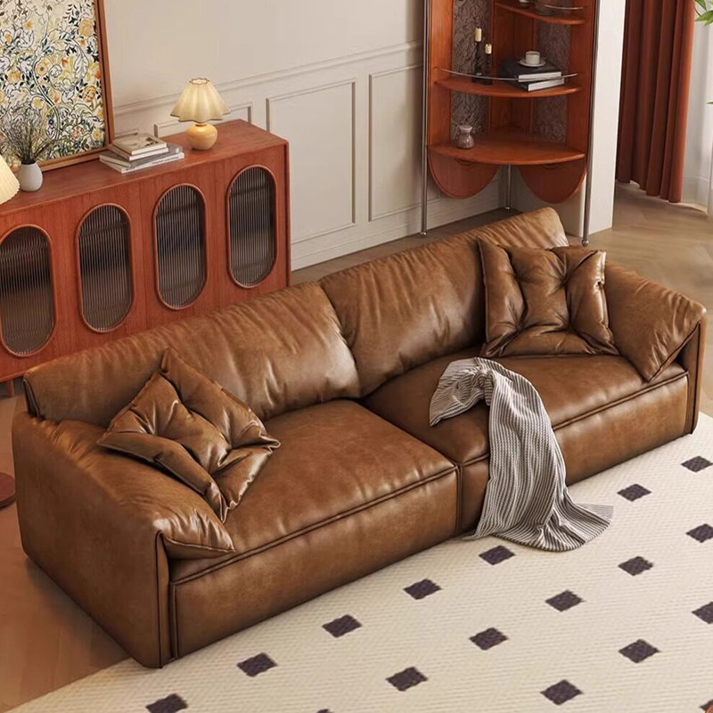 Causeuse-coussin modulaire en similicuir brun