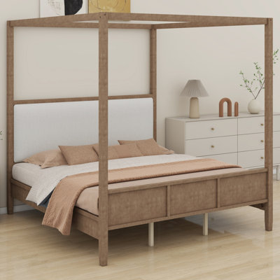 Lit plateforme à baldaquin en bois avec tête de lit tapissier