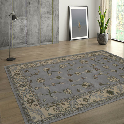 Tapis oriental multicolore en laine touffeté à la main