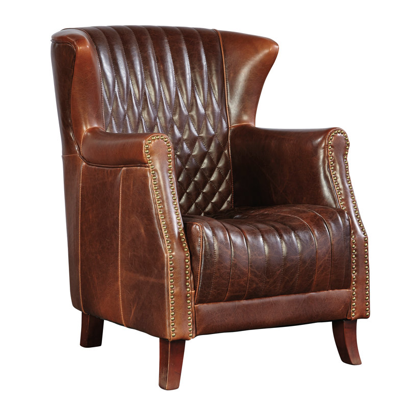 Fauteuil à oreilles en cuir matelassé Paris Flea