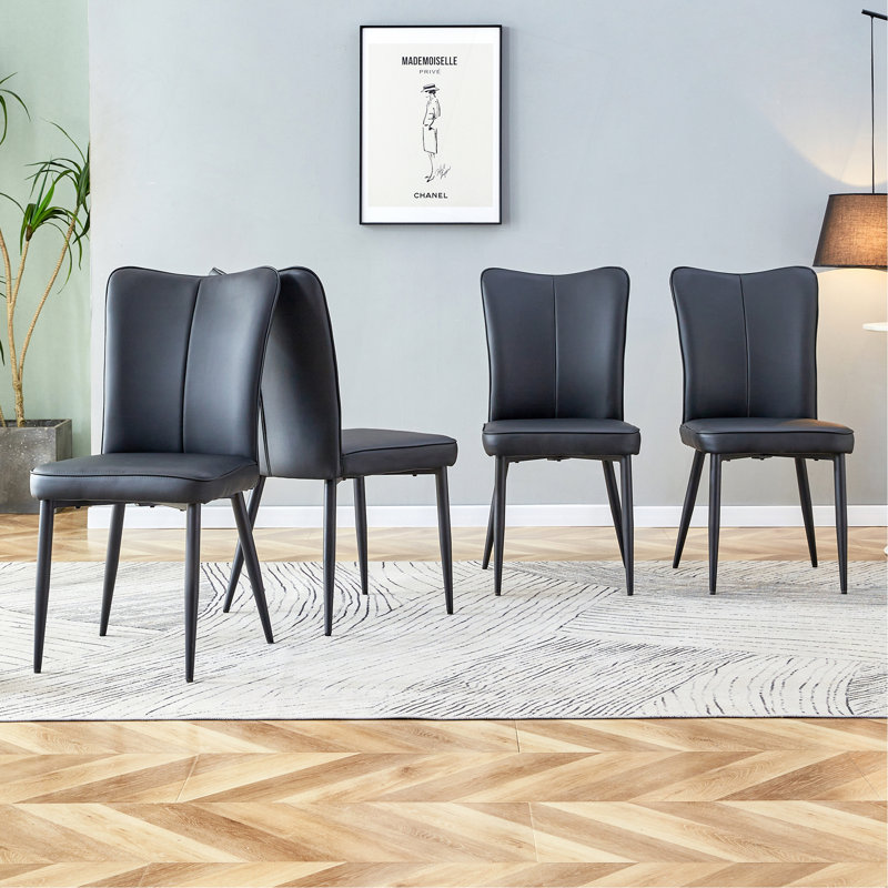 Ensemble de chaises de bureau et de salle à manger moderne et minimaliste, 4 pièces avec sièges en polyuréthane et pieds en métal, polyvalent pour de multiples espaces.