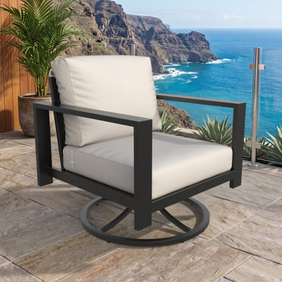 Fauteuil à bascule pivotant Oltjana avec dossier à lattes inclinées, structure en aluminium et coussins Sunbrella