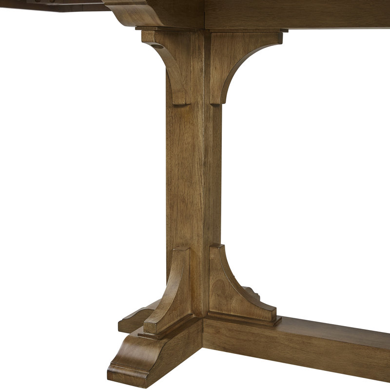 Table à tréteaux au fini amande, extensible de 213 à 290 cm, plateau à motif géométrique, placage, piètement en bois massif, largeur 112 cm, hauteur 76 cm, poids du placage : 104 kg
