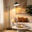 Lampe sur pied à bras réglable noire et dorée de style industriel, à gradation multi-angle, convient aux salons et aux chambres à coucher, facile à utiliser avec une pédale de commande.