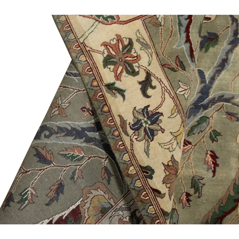 Hand Knotted Wool Oriental Area Rug in Green And Ivory