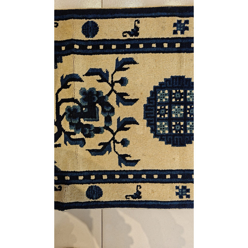 Tapis chinois antique blanc et bleu