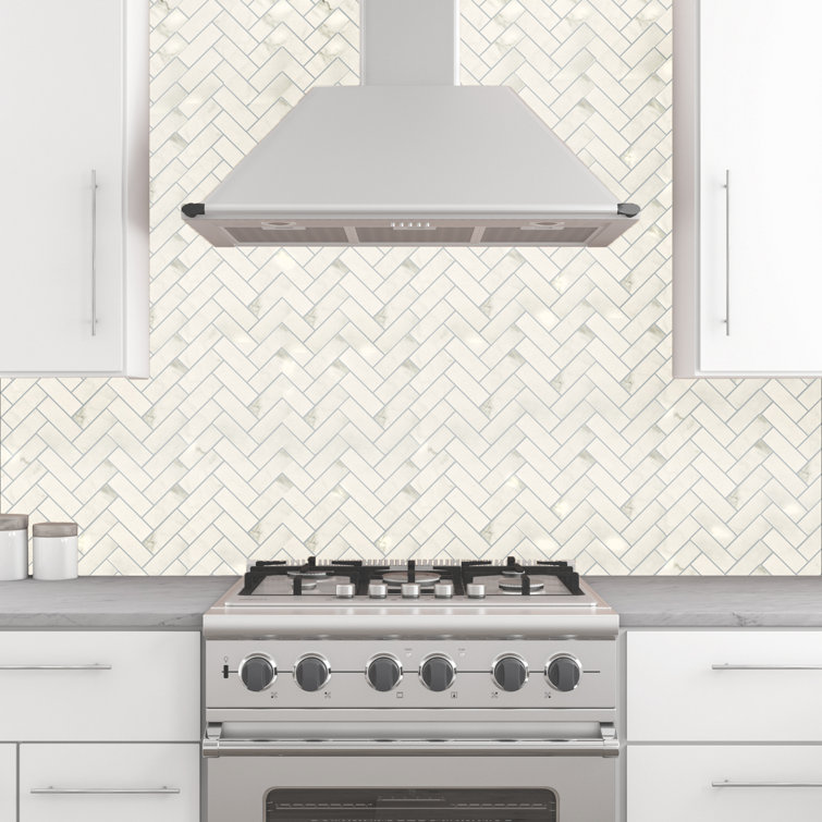 Herringbone porcelain above the stove 3ft wide mural effect, then