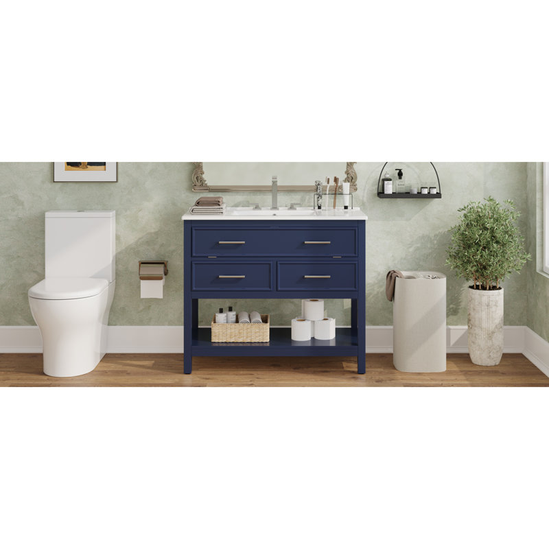 Élégant essentiel de salle de bain avec motif en céramique bleu: parfait pour tout décor de salle de bain moderne