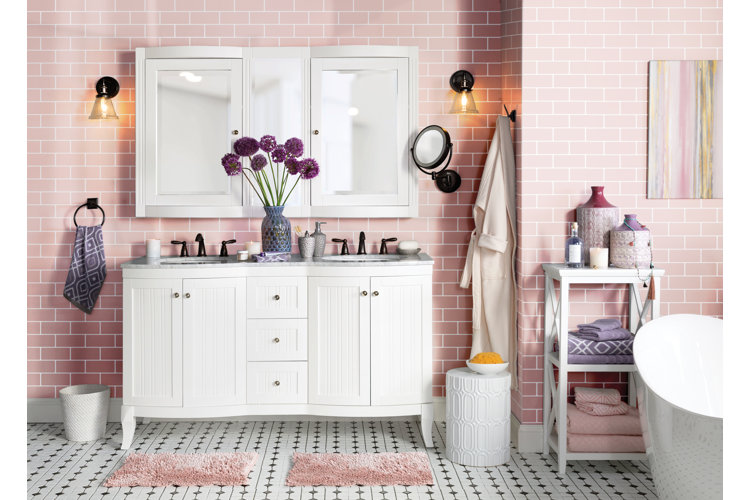 pink bathroom wall tiles with white shelving