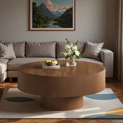 Table basse ronde moderne avec rainures, plateau de table épais et base robuste