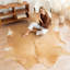 Tapis beige en peau de vache-118044340