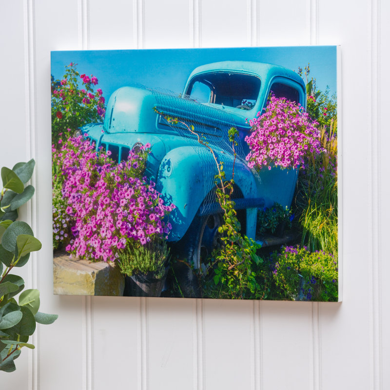 Photographie de voiture bleue Aldemar sur métal