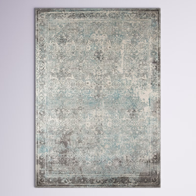 Tapis turquoise, gris foncé et ivoire à motif abstrait Allina