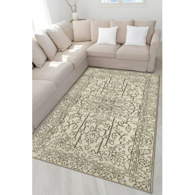 Tapis décoratif à motif traditionnel beige et luxueux