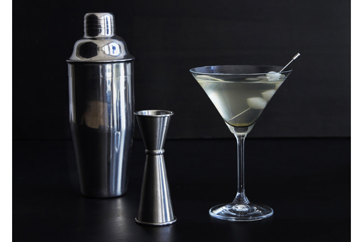 martini in stemmed martini glass, jigger, and cocktail shaker