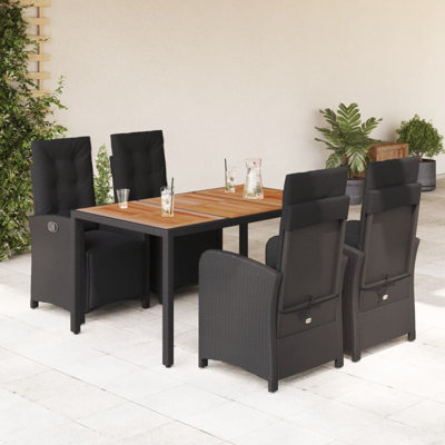 4 - Person Rectangular Solid Wood Patio Dining Set with Cushions included
