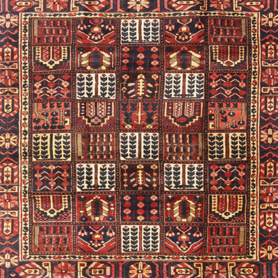 Tapis brun / rouge traditionnel