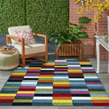 Jakobee Geometric Area Rug