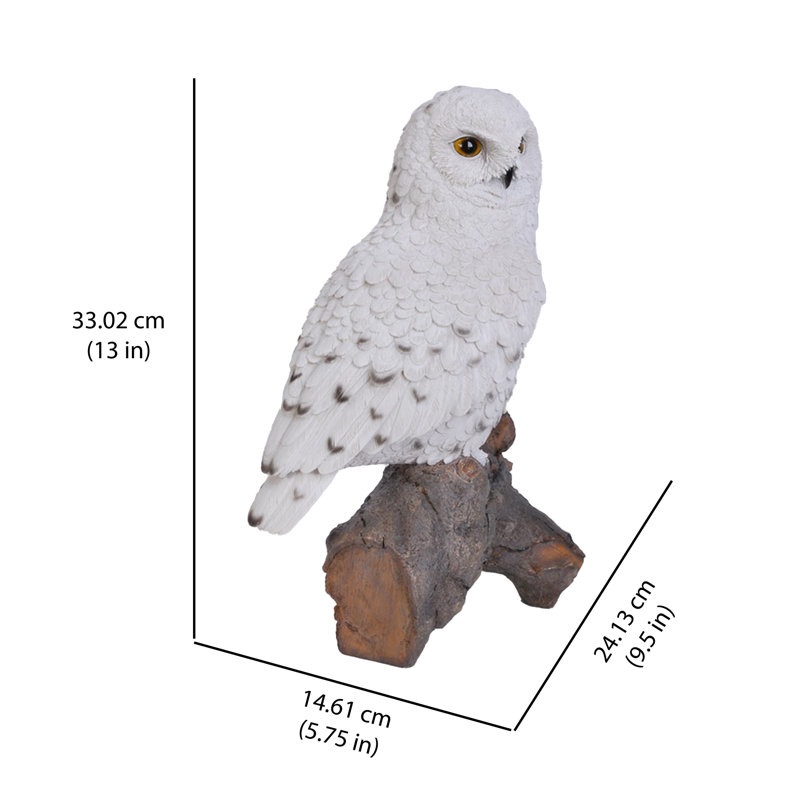 Statue hibou sur souches snowy