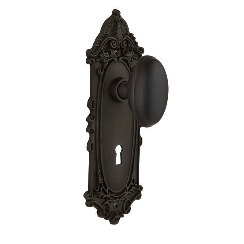 Plaque victorienne avec trou de serrure décoratif et bouton de porte Homestead, 2-3/4", Bronze frotté à l'huile