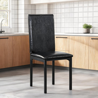 Ensemble de 4 chaises de salle à manger rembourrées en métal avec cadres noir de jais et sièges en similicuir brun, pratiques pour la cuisine et la salle à manger