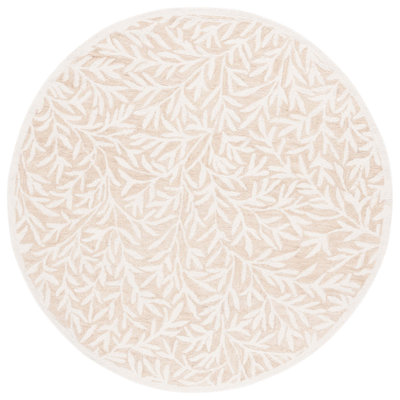 Jacameron Hand Tufted Wool/Cotton Floral Rug in Beige/Ivory