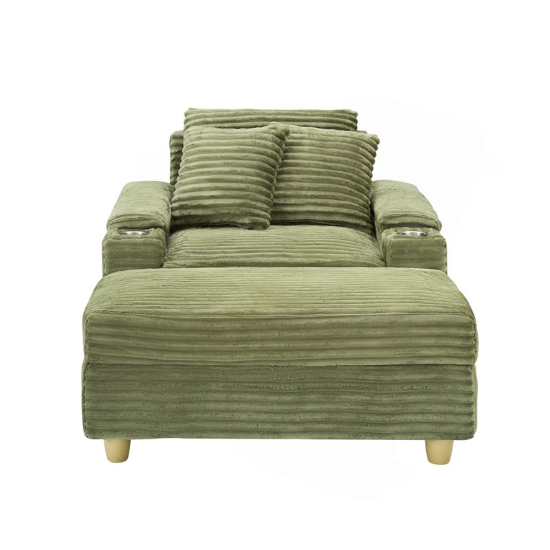 Canapé simple en velours côtelé avec un coussin, deux coussins décoratifs, un repose-pieds et deux espaces de rangement.