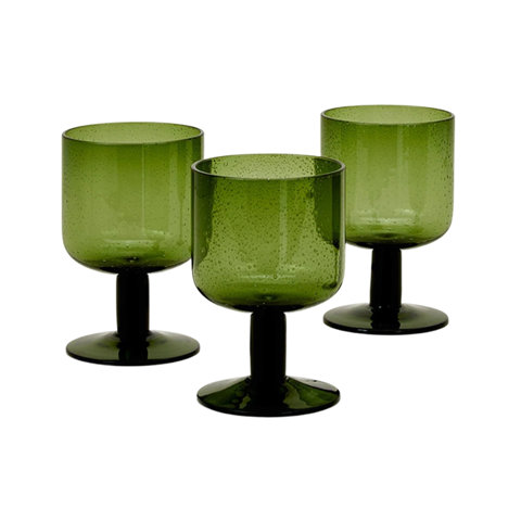 Set of three green, bubble-glass pedestal goblets with dark green stems and bases.