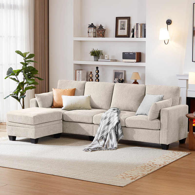 Canapé modulaire réversible en tissu Corduroy avec canapé convertible Chasie, siège en L à 4 places avec rangement et repose-pieds pour le salon