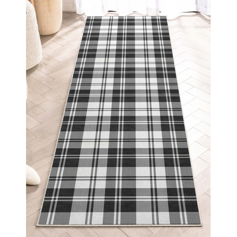 Tapis noir à tissage plat Kehr