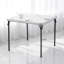 Table pliante en marbre blanc à bord droit pratique pour un usage domestique