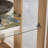 Lighted Curio Cabinet - Elegant Glass Display Cabinet with Adjustable Shelves, 2 Doors, and 1 Drawer - Wine Storage Sideboard with Included Bulb