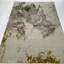 Tapis doré à motif abstrait Peirson-955259793