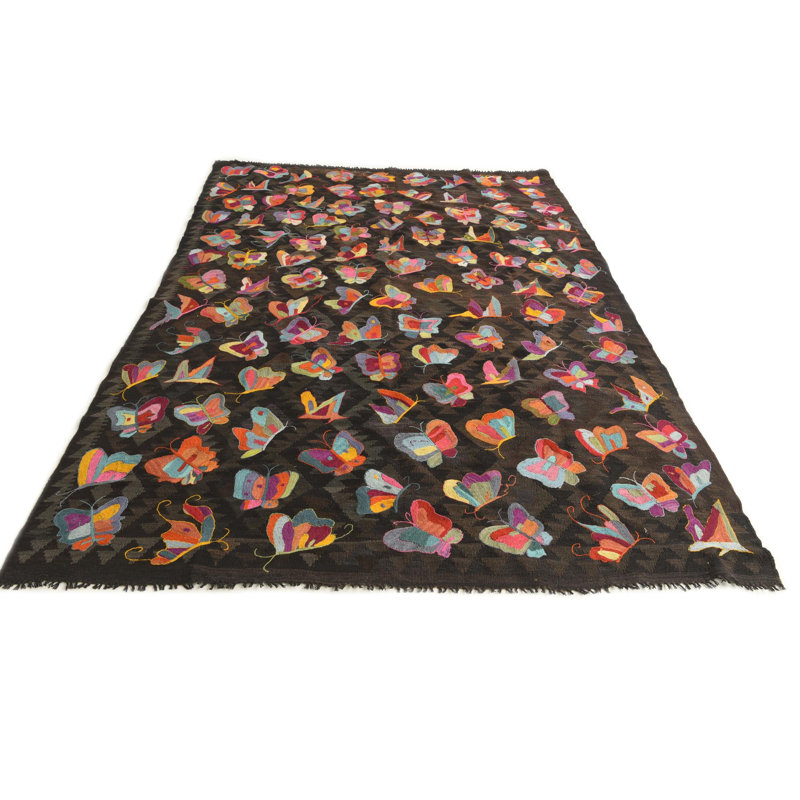 Tapis brun foncé Pelfrey