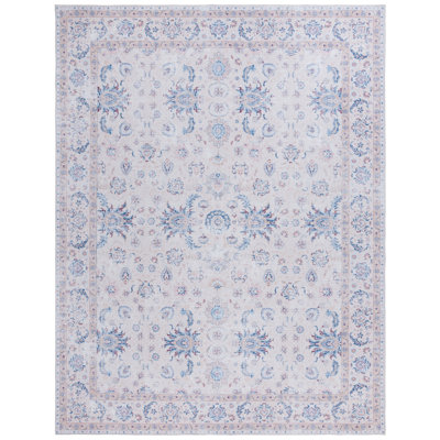 Cvjatko Oriental Machine Woven Polyester Area Rug in Ivory/Blue