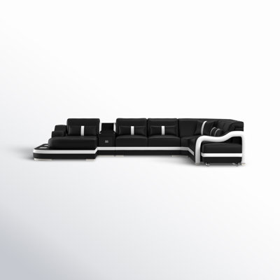 Canapé modulaire en cuir avec repose-pieds Arunvir Aphra