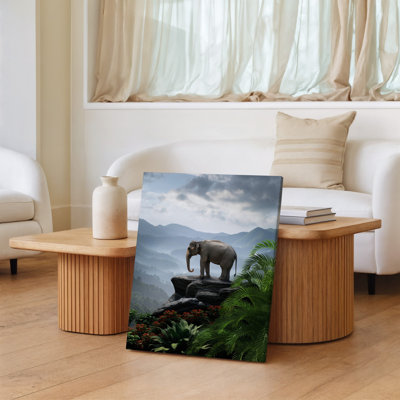Canvas A Majestic Elephant Stands Proudly Atop A Rocky Outcrop Surrounded Wall Art By Lush Greenery And Vibrant Tropical Plants The Canvas Wall Art