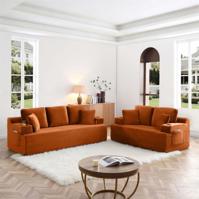 Compression Floor Sofa With Built-In Cup Holders And Side Pockets Soft Corduroy Upholstery For Effortless Comfort And Space-Saving Versatility.