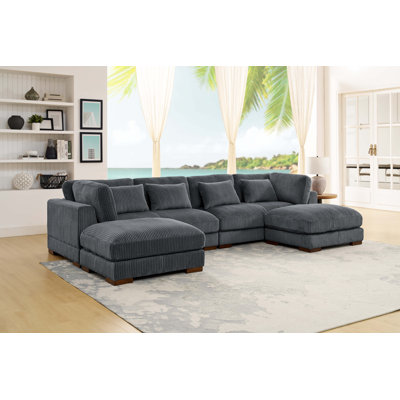 Croy 137" Wide Symmetrical Modular Corner Sectional with Ottoman
