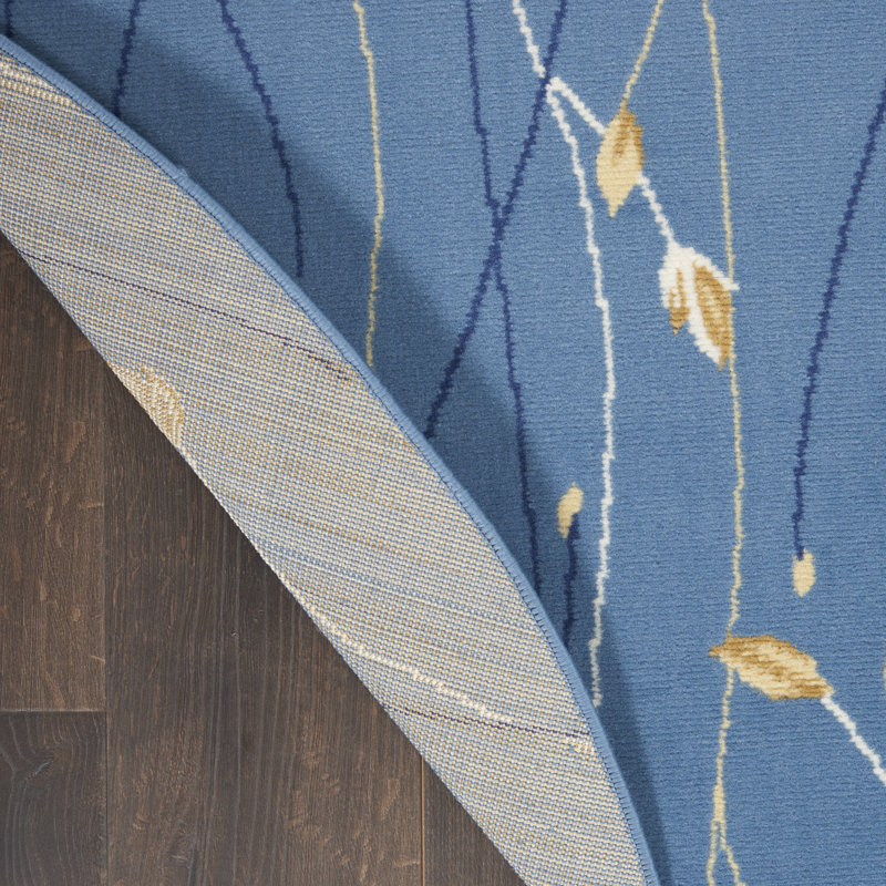 Tapis bleu clair Aratrika, Rond 4 pi
