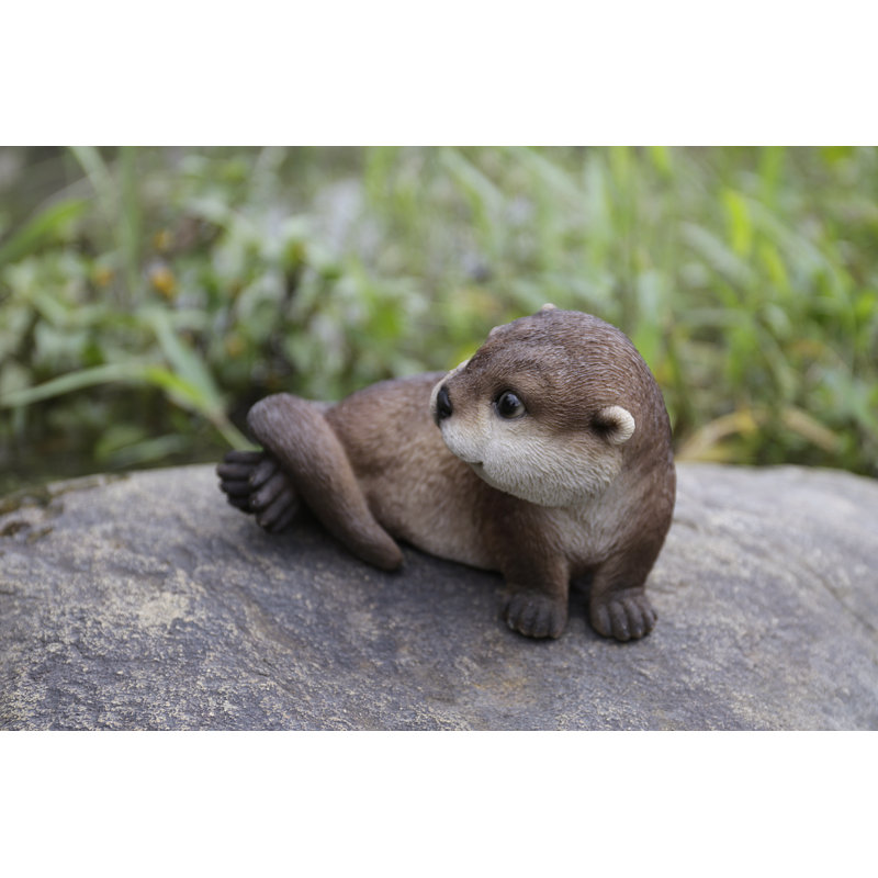 Otter Laying Back Statue