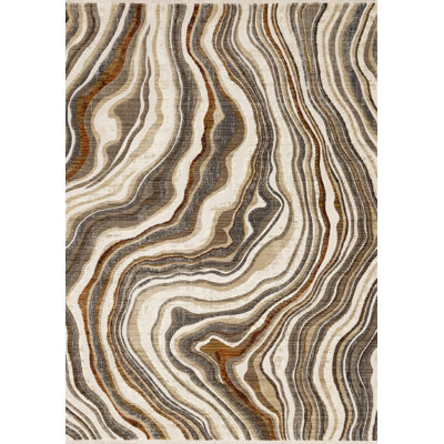 7' X 10' Cream And Beige Abstract Area Rug