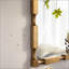 Miroir mural doré