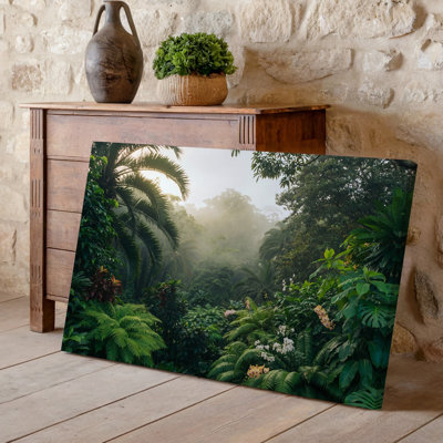 Toile une scène de jungle luxuriante remplie de verdure vibrante mettant en vedette une variété de plantes tropicales, y compris de grandes fougères et une toile d'art murale