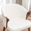 Chaise de salle à manger rembourrée en similicuir Devault-1762743381