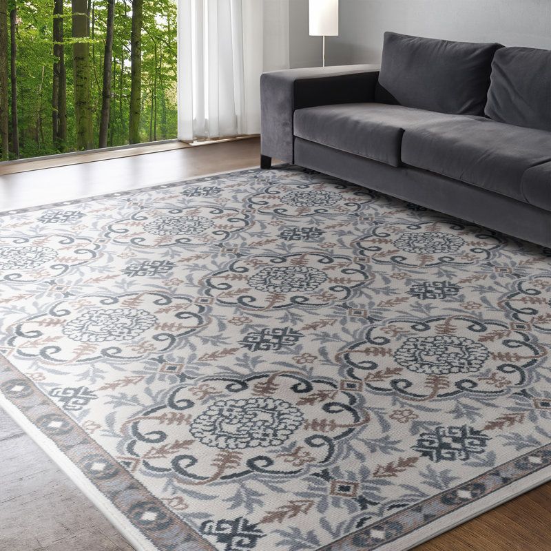 Tapis d'intérieur crème / gris / bleu à volutes de style oriental Hoban pour le salon, la chambre à coucher et la salle à manger